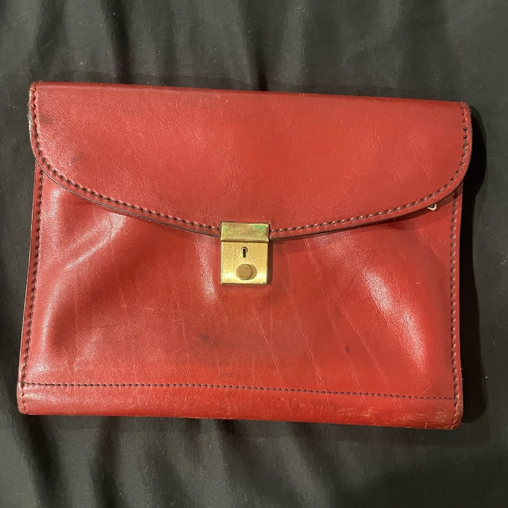 Beautiful vintage cherry genuine leather pocket book.